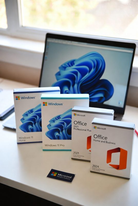 Genuine Microsoft Windows and Office software on a desk in a UK home office, highlighting authentic licences and trusted software