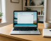 Laptop showing Activate Windows watermark on screen in modern home office