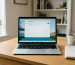 Laptop showing Activate Windows watermark on screen in modern home office